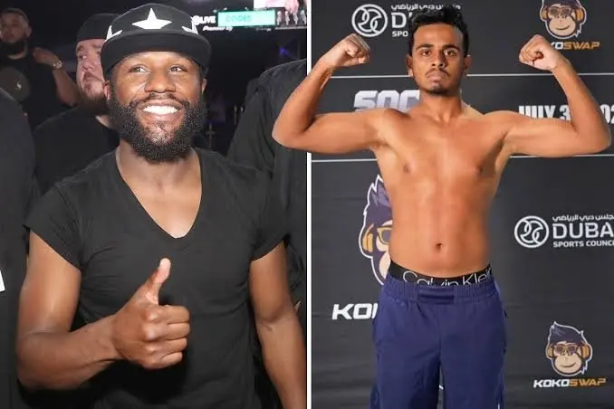 Floyd Mayweather next to Rashed Belhasa at a weigh-in event